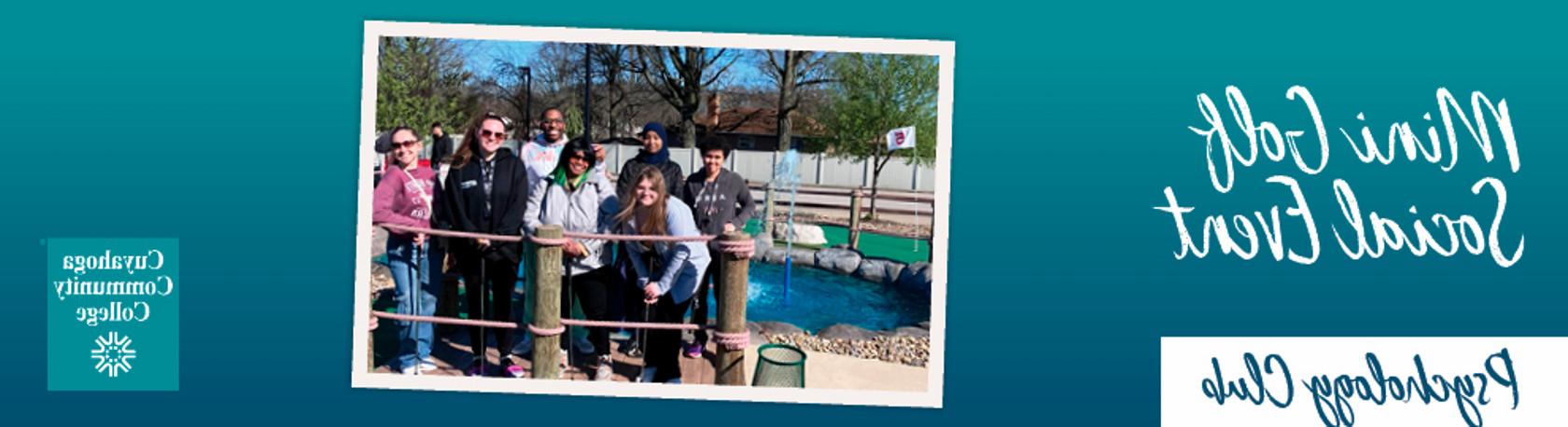 Photo of students posing at a mini golf course during a social outing